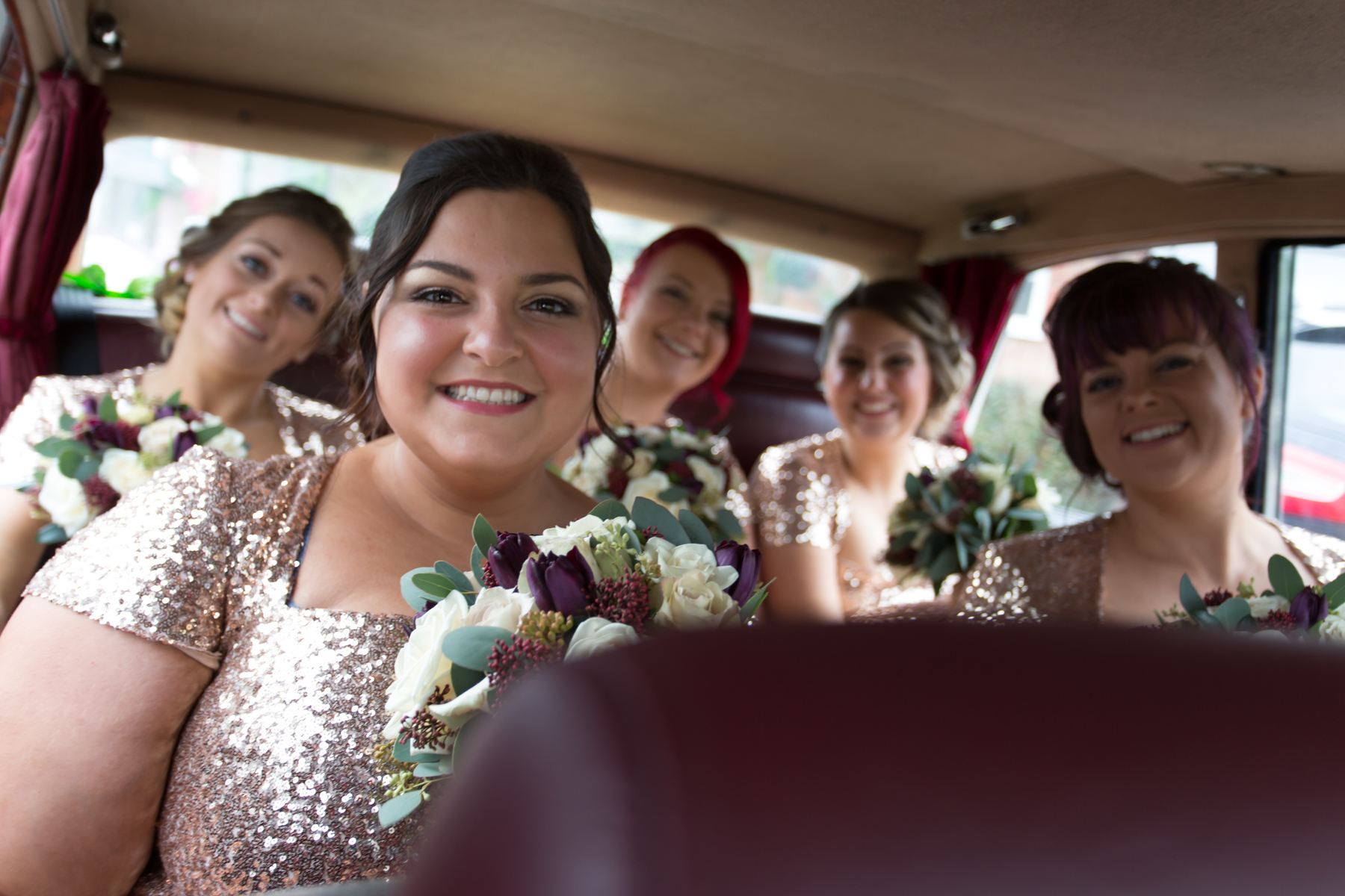 Bridesmaids in the car