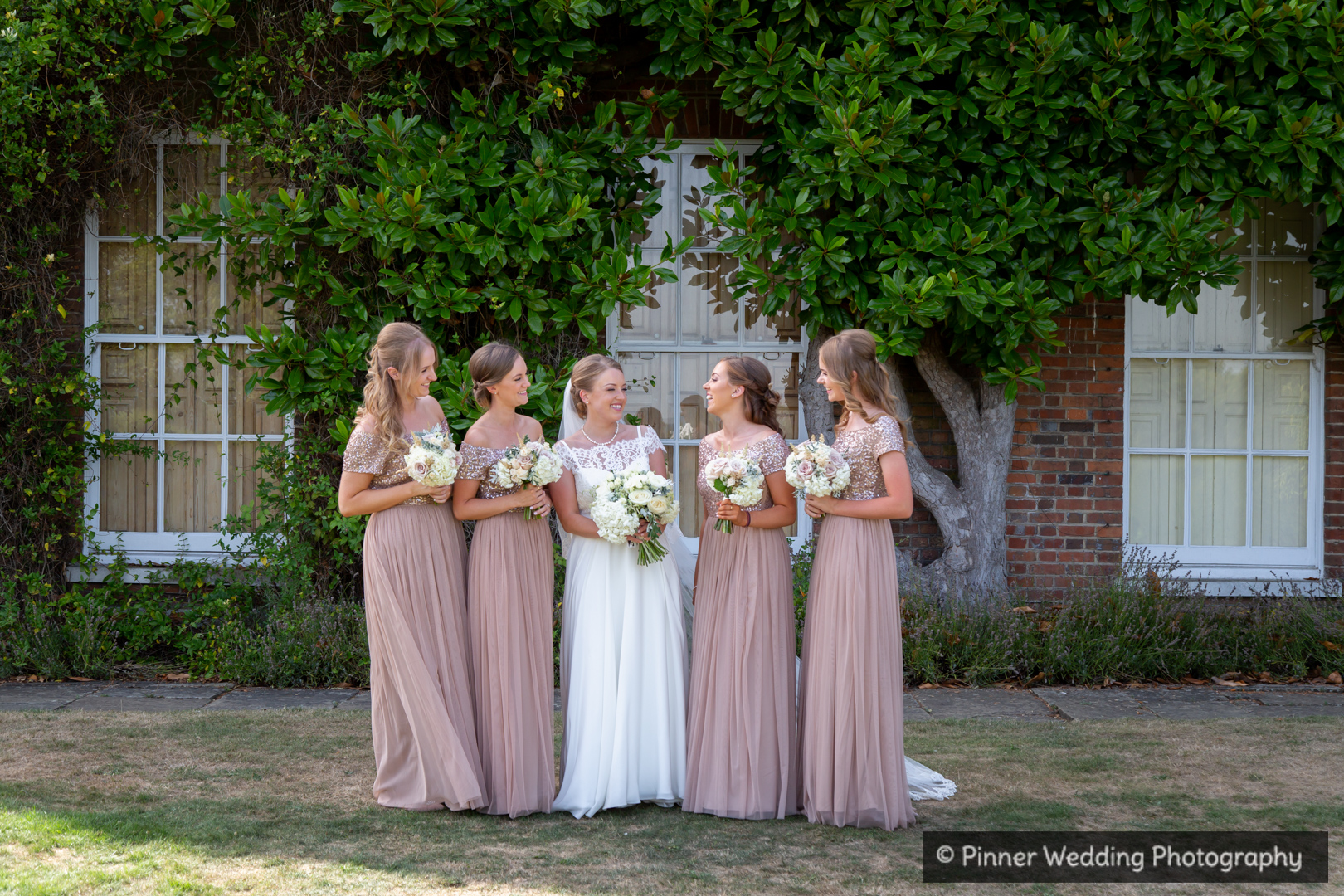 Bride-bridesmaids-wedding-photography-micklefield-hall-sarratt-hertfordshire
